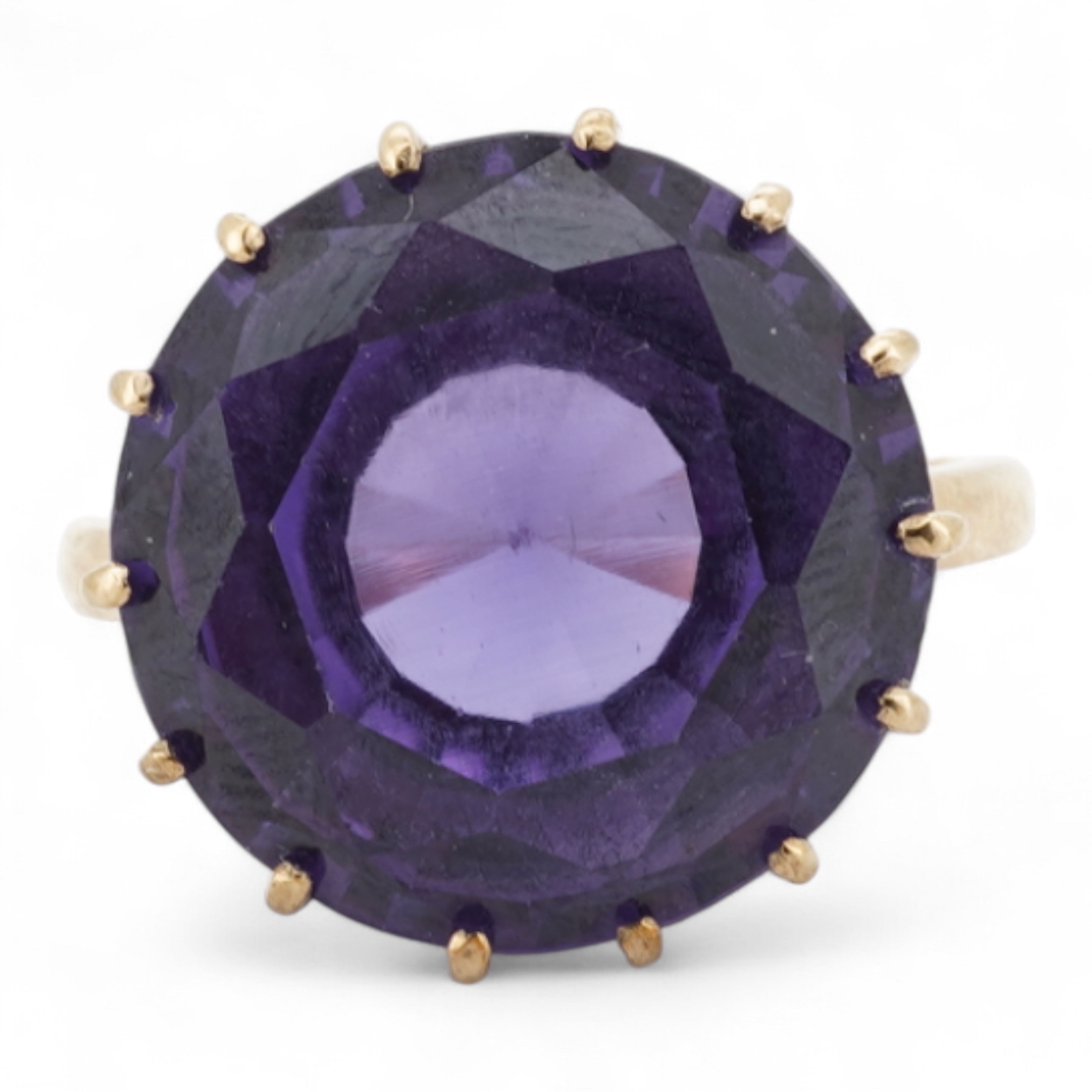 A synthetic colour-change sapphire ring, claw-set with a circular-cut synthetic colour-change sapphire measuring approximately 15 x 15 x 7.9mm, mounted in gold, size H1/2